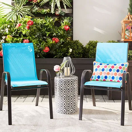 add colourful cushions to outdoor furniture