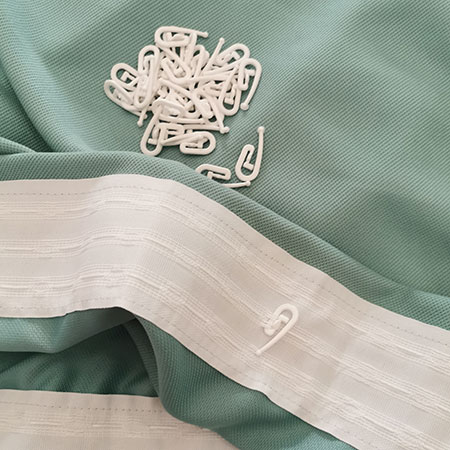 insert curtain hooks in curtain tape