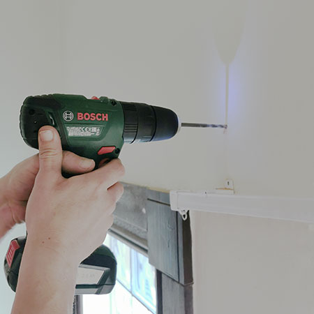 mark location and drill holes for curtain track brackets