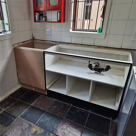 install new kitchen under sink cabinet
