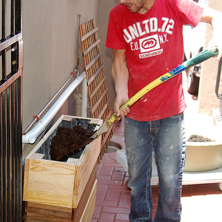 fill planter box with soil