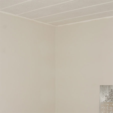 adding crown moulding to walls and ceiling