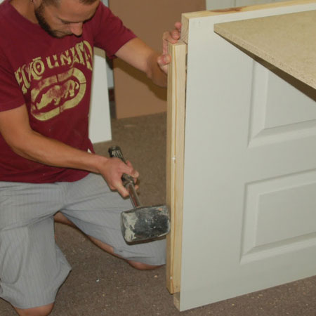 insert 32 x 32 pine into opening at base or top of door