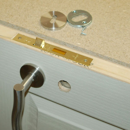 installing modern door handles and lock