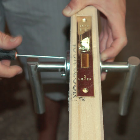 screw handle onto door