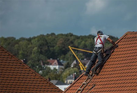Why You Should (and Shouldn't) Work On Your Own Roof