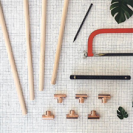 easy plant stands made using pine dowels and copper fittings