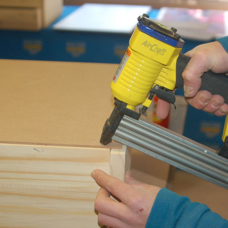 attach back with aircraft nail gun