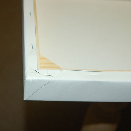 secure canvas to wood frame