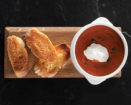 Warm up this winter with The Hussar Grill’s legendary tomato soup