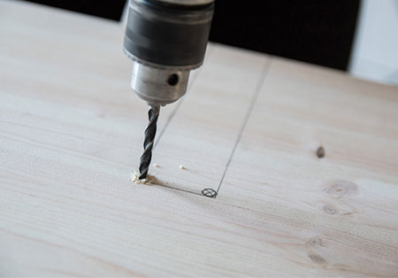 pre-drill holes in corners