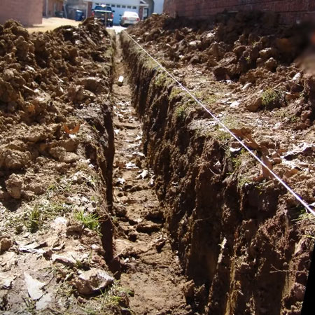 depth of trench for french drain