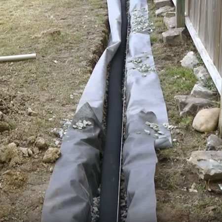 place pipe in trench