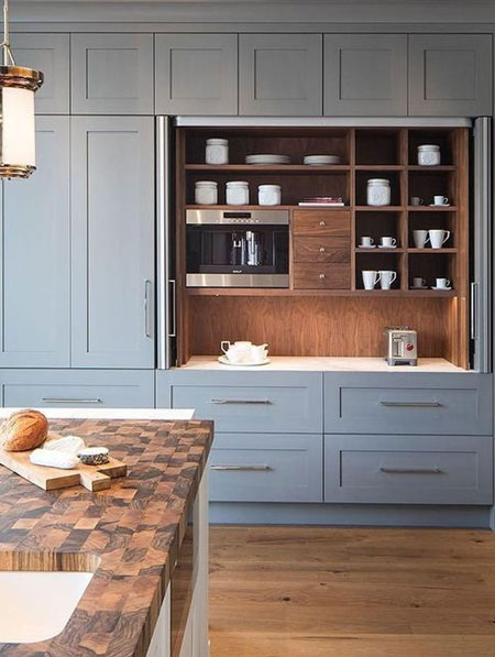 wood cabinets in painted kitchen