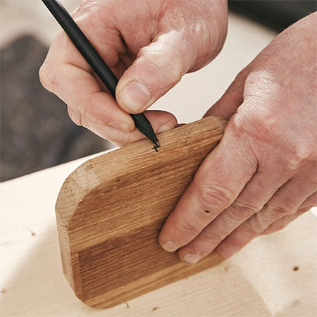mark location for hole for rod to mount