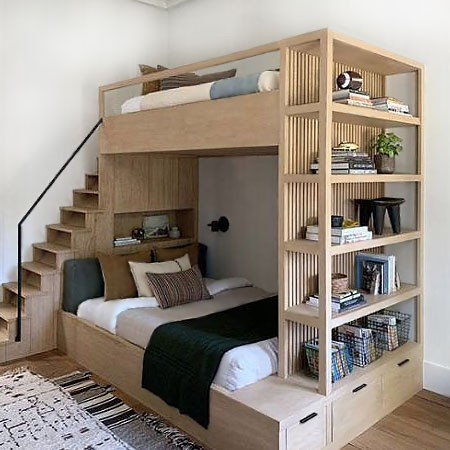 bunk bed with storage cupboards