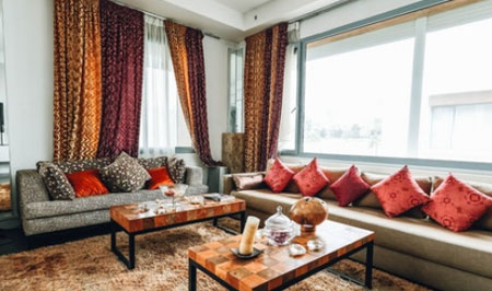 Hang some soundproof curtains on your windows