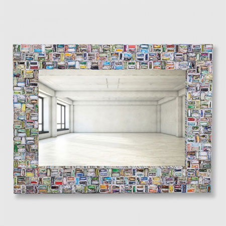 This picture frame is made up of hundreds of folded pieces of paper. 