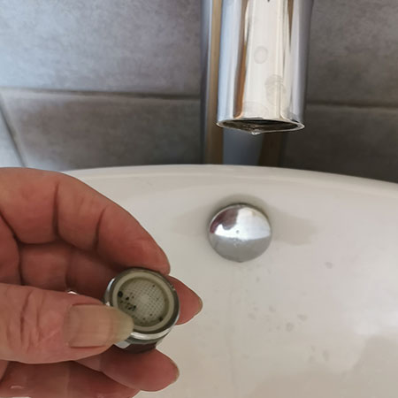 how to clean tap filter