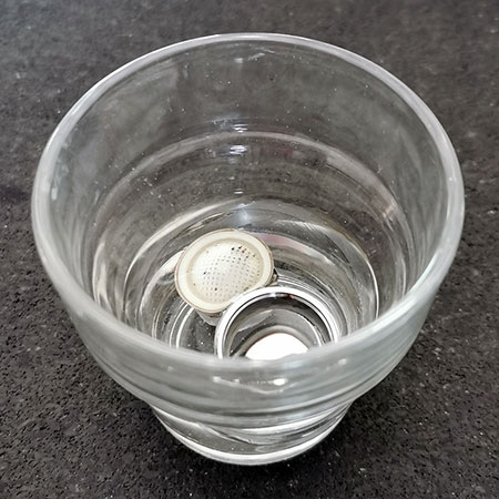 how to clean tap filter