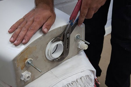 use locking pliers to unscrew flush mechansim