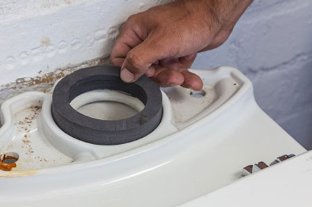 secure dual flush mechanism and components to the cistern