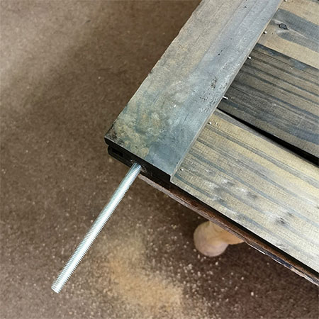adding rebar to secure fence panel to top of wall