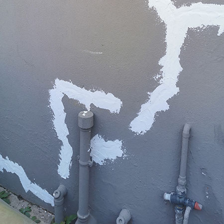 chase out and fill cracks exterior walls