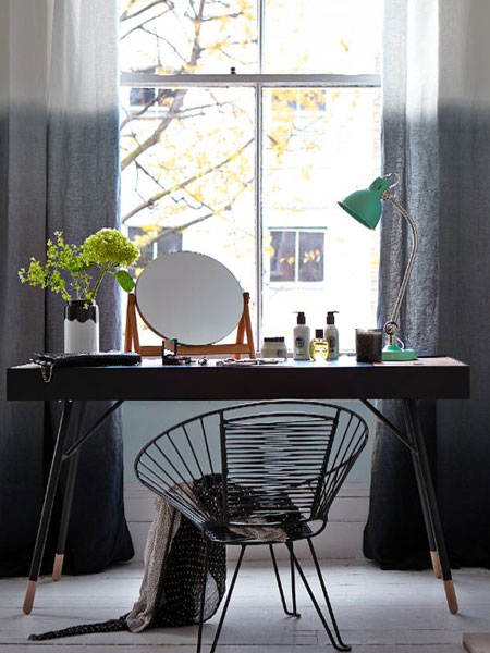 dressing table in front of window