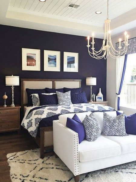 classic blue feature wall in bedroom