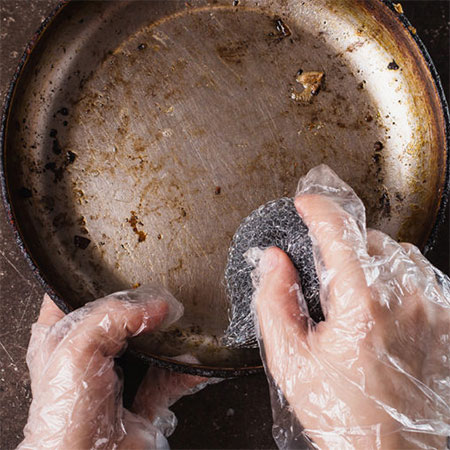 don't clean stainless steel with steel wool or metal scourers