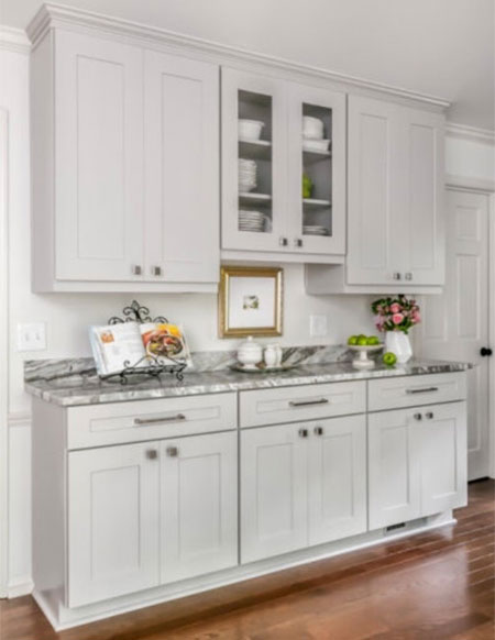 tiny pantry replaced by custom cabinetry in kitchen