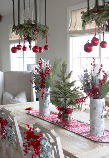 festive bauble chandelier above dining table