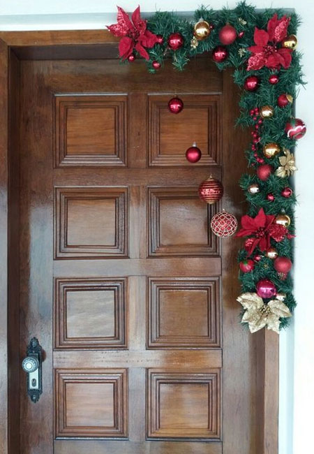festive ornaments on front door