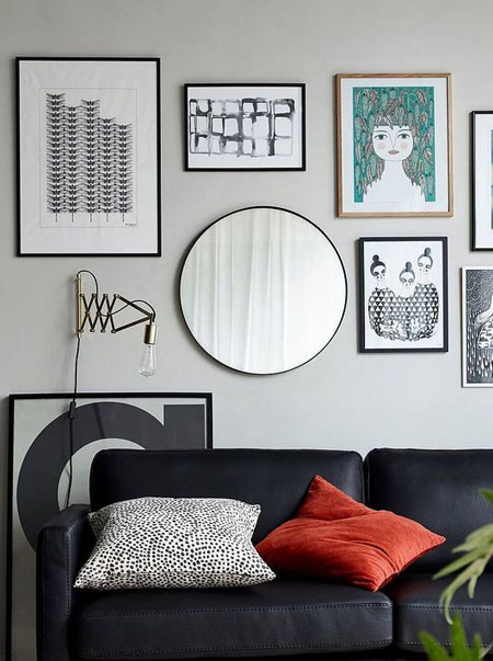 gallery wall above long sofa or couch