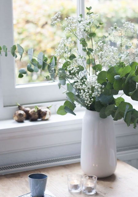arrangement with eucalyptus and babys breath