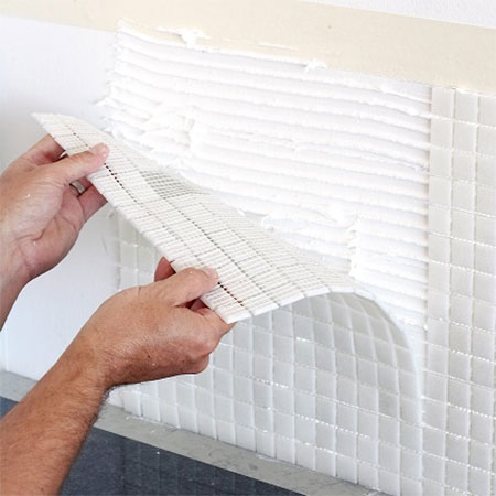 apply mosaic  tile sheet to wall