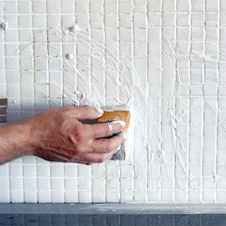 apply grout to mosaic tile backsplash