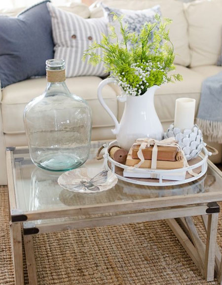 add accessories to coffee table for personality and charm