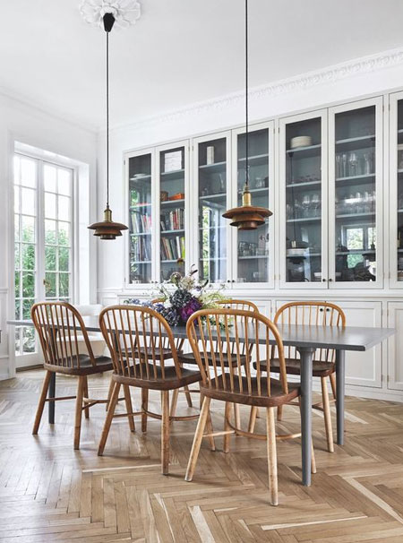 practical floor to ceiling storage in dining room