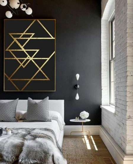 metallic touches in black and white bedroom