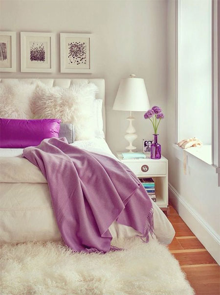 white bedroom with pops of lilac colour