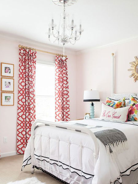white bedroom with pops of colour