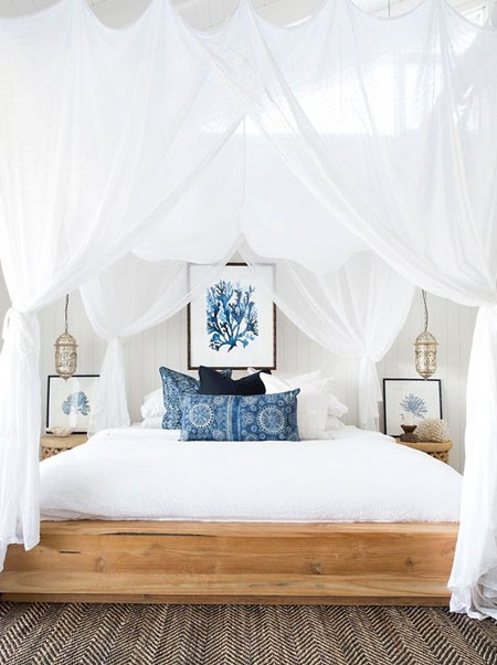 white bedroom pops of blue colour