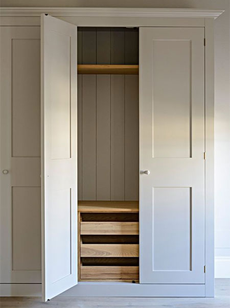 narrow built in cupboards for clothes or closet