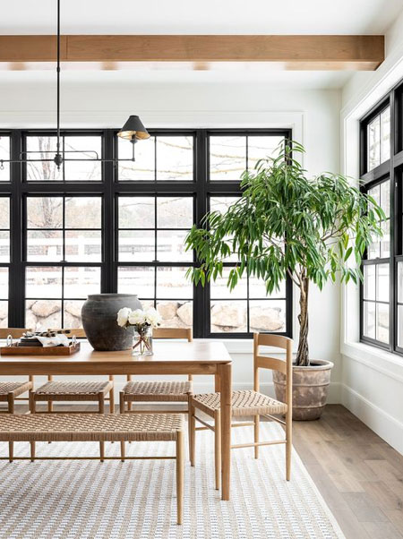 add plants for warmth in all white dining room