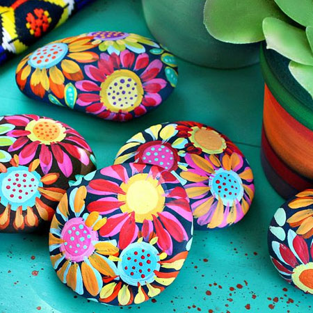 colourful painted pebbles in garden