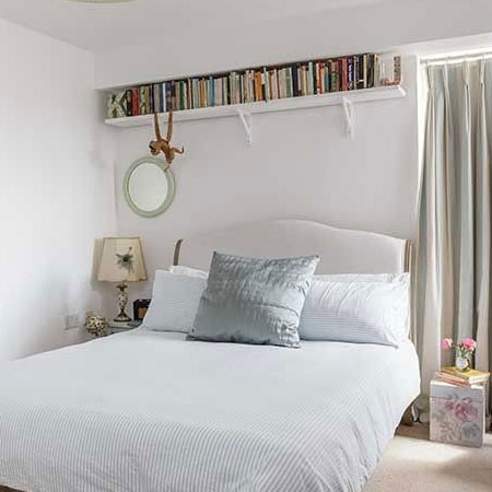 bookshelf for storage above bed