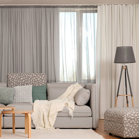 trade lightweight curtains for heavier curtains in winter