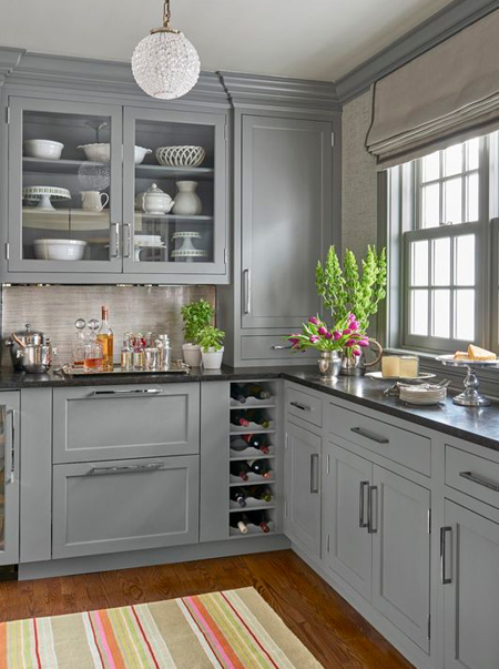 grey kitchen with black countertops